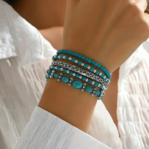 Armbandenset mit türkisfarbenen Perlen